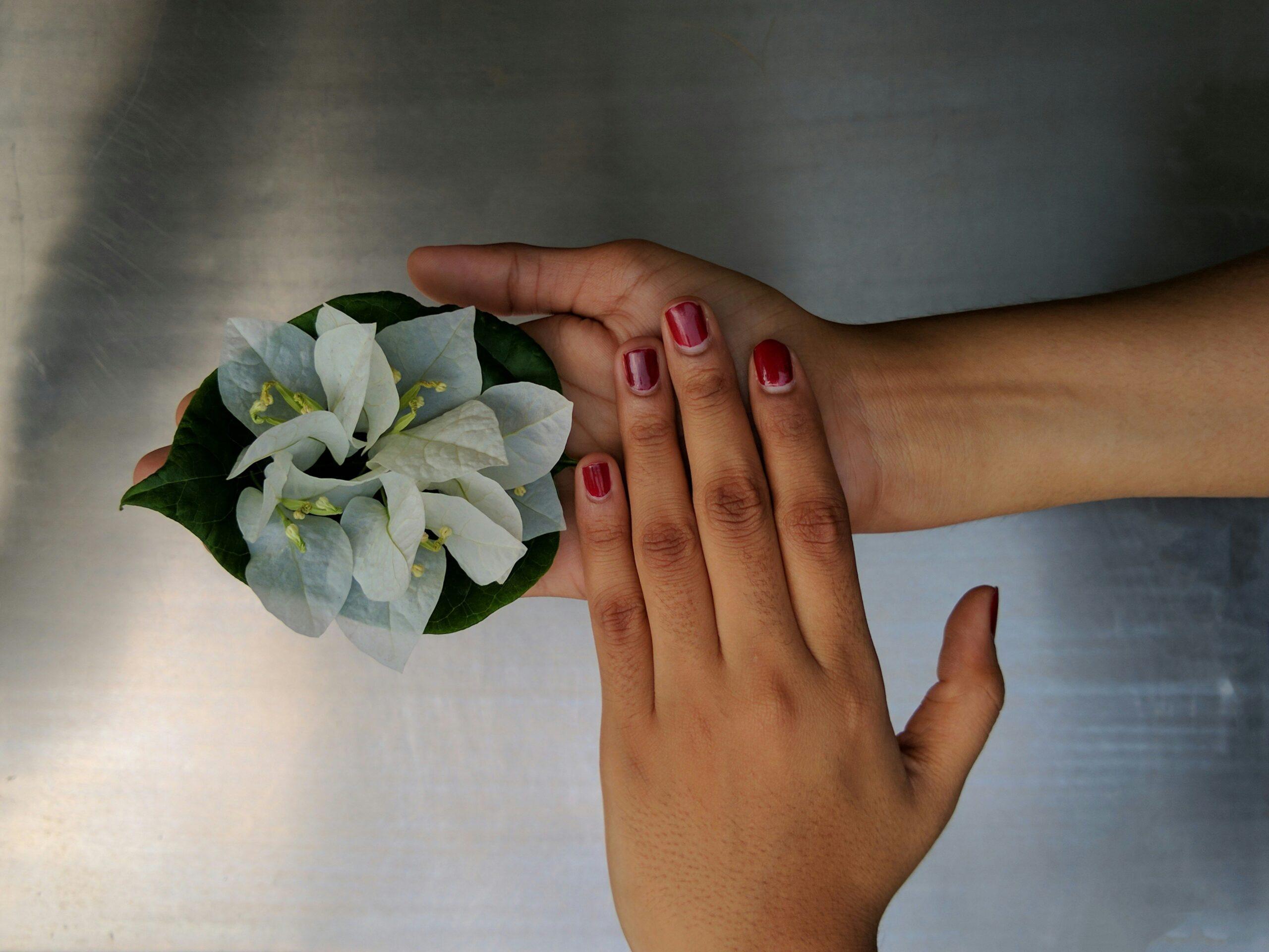 A close-up shot of a beautifully arranged hand tied bouquet tied with biodegradable twine.